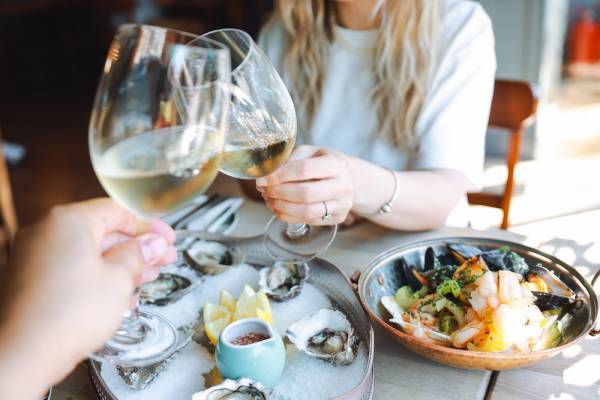 couple enjoying a nice seafood dinner out
