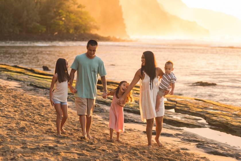 family on beach in maui